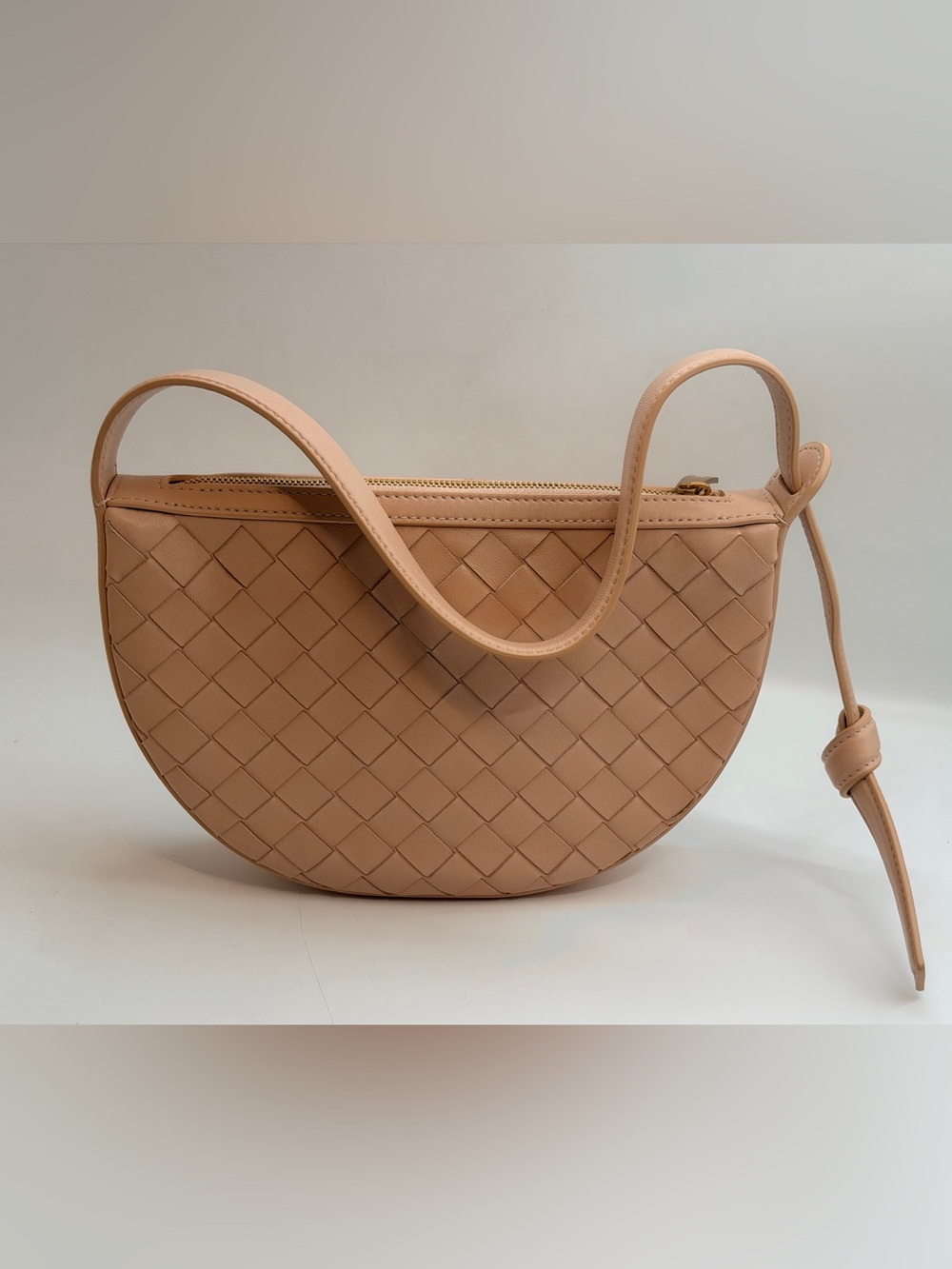 Woven Leather Half-Moon Shoulder Bag in Peach Beige Nude Pink